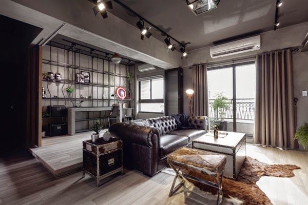 apartamento-estilo-industrial-sofa-chester-negro-estanterías-metal