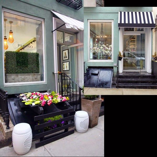 fachada-peluquería-nueva-york-toldo-rayas-blancas-y-negras