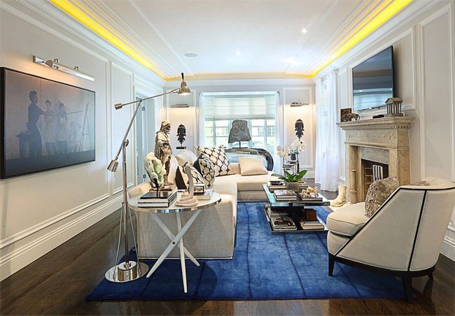 salón-decoración-elegante-sofá-y-butacones-blancos
