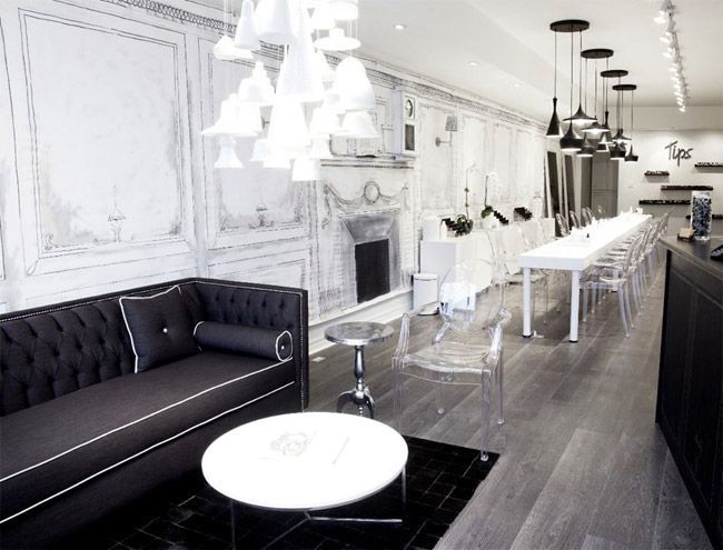 salón-manicura-sofa-negro-decorado-en-blanco-y-negro-sillas-louis-ghost