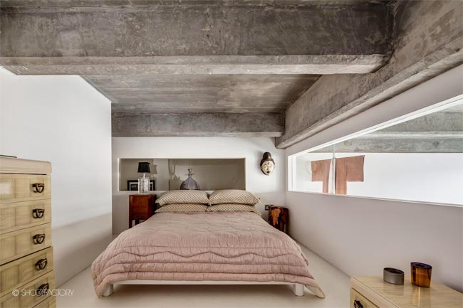 dormitorio-doble-altura-loft-vigas-cemento-