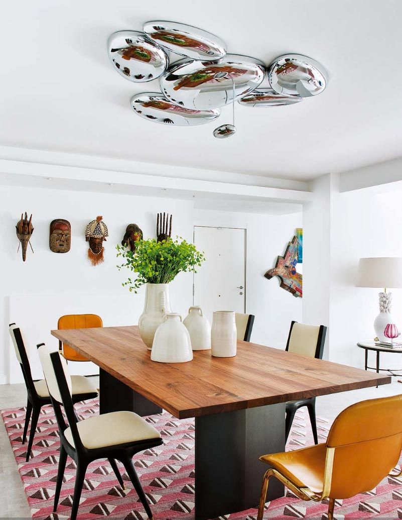 comedor-con-mascaras-africanas-make-sense-studio