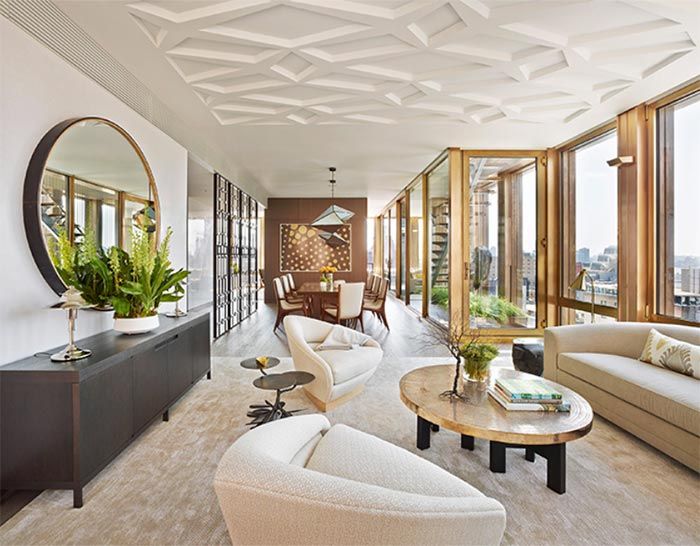 8-salon-decorado-tonos-tierra-sofa-en-l-butacas-estilo-midcentury