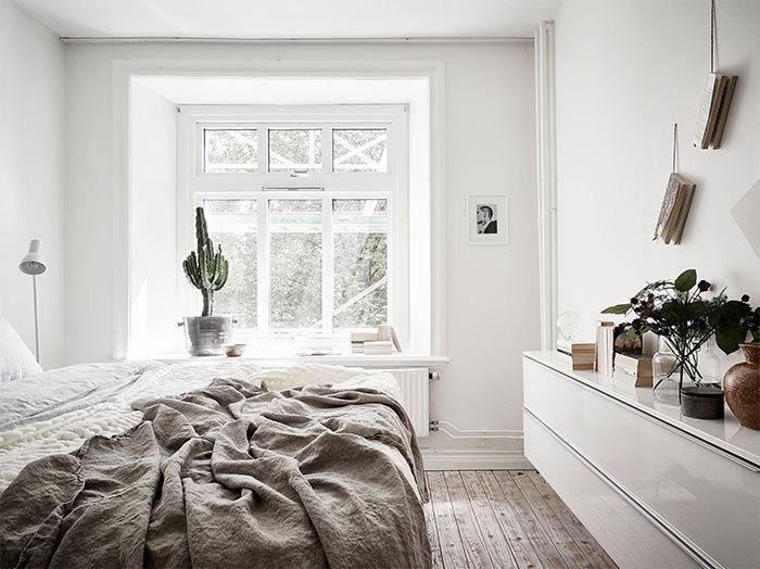 dormitorio-estilo-nordico-decoracion-escandinava-suelo-listones-madera