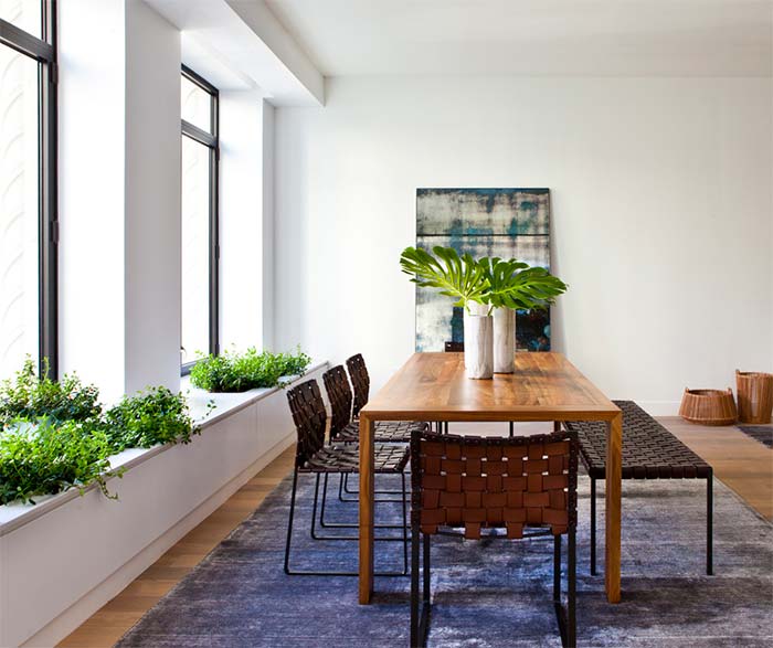 comedor-moderno-sillas-cuero-trenzado