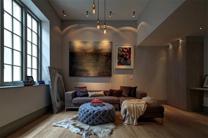 salon-con-sofa-chaiselongue-y-puf-mesa-centro