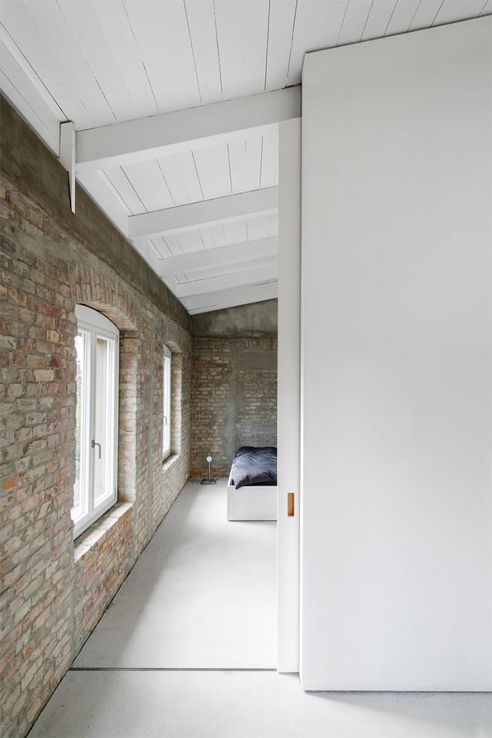dormitorio-casa-paredes-ladrillo-varios-pisos-berlin
