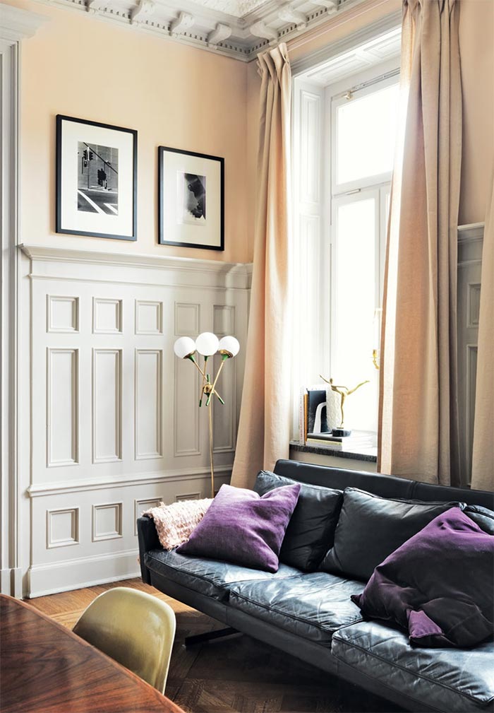 salon-sofa-cuero-gris-oscuro-estilo-nordico-decoracion