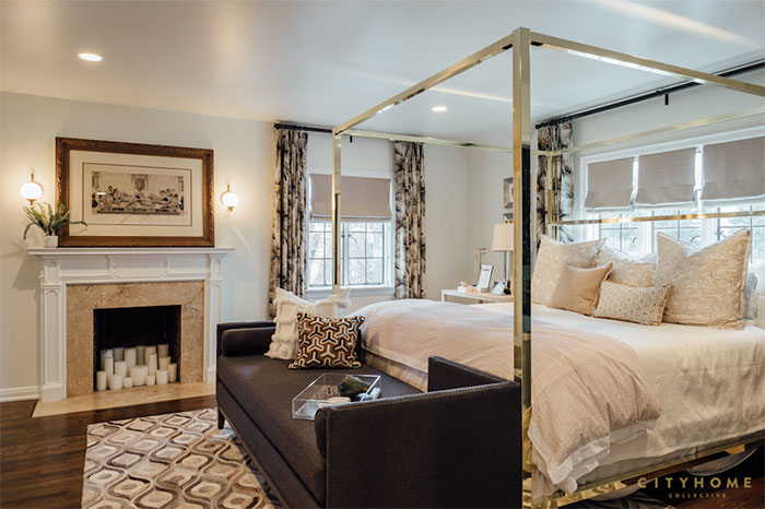 dormitorio-cama-con-baldaquino-metal-dorado